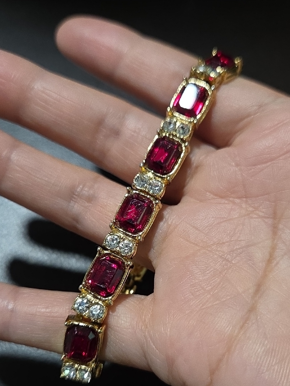 Gold-Tone Tennis Bracelet with Deep Red Stones